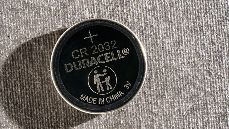 A Duracell CR2032 battery.