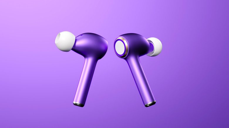 A pair of purple earbuds on a purple background.