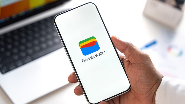 The Google Wallet logo displayed on a smartphone.