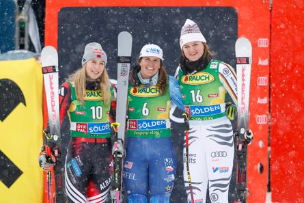 Paula Moltzan (center) celebrates her first career World Cup victory alongside runner-up Lara Colturi of Albania (left) and third-place finisher Emma Aicher of Germany after the women’s giant slalom i