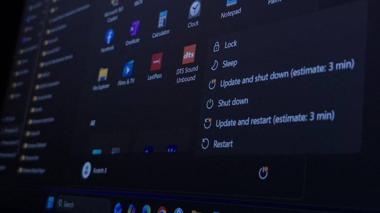 Windows 11 shutdown and restart options in the Start Menu, prompting to install an update.
