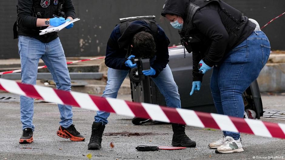 Firefighters intervene on a site of a petrol station where a man opened fire from his car, killing one person and injuring four others according to police sources, in Trappes, Paris' suburb on October