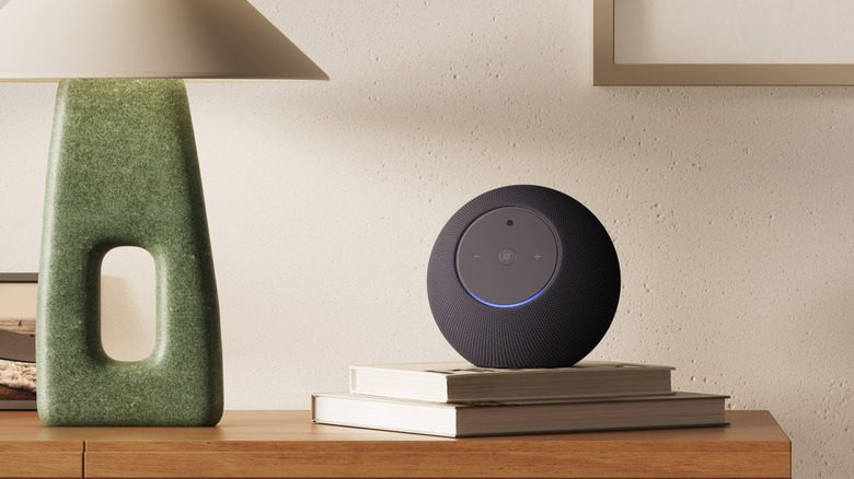 Smart speaker on top of books