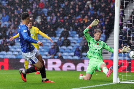 Rangers’ Kevin Kelsy scores the third goal against St Johnstone.