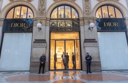In Galleria Vittorio Emanuele, some shops are closed and have been cleared of their merchandise, others have their display windows covered and security increased.